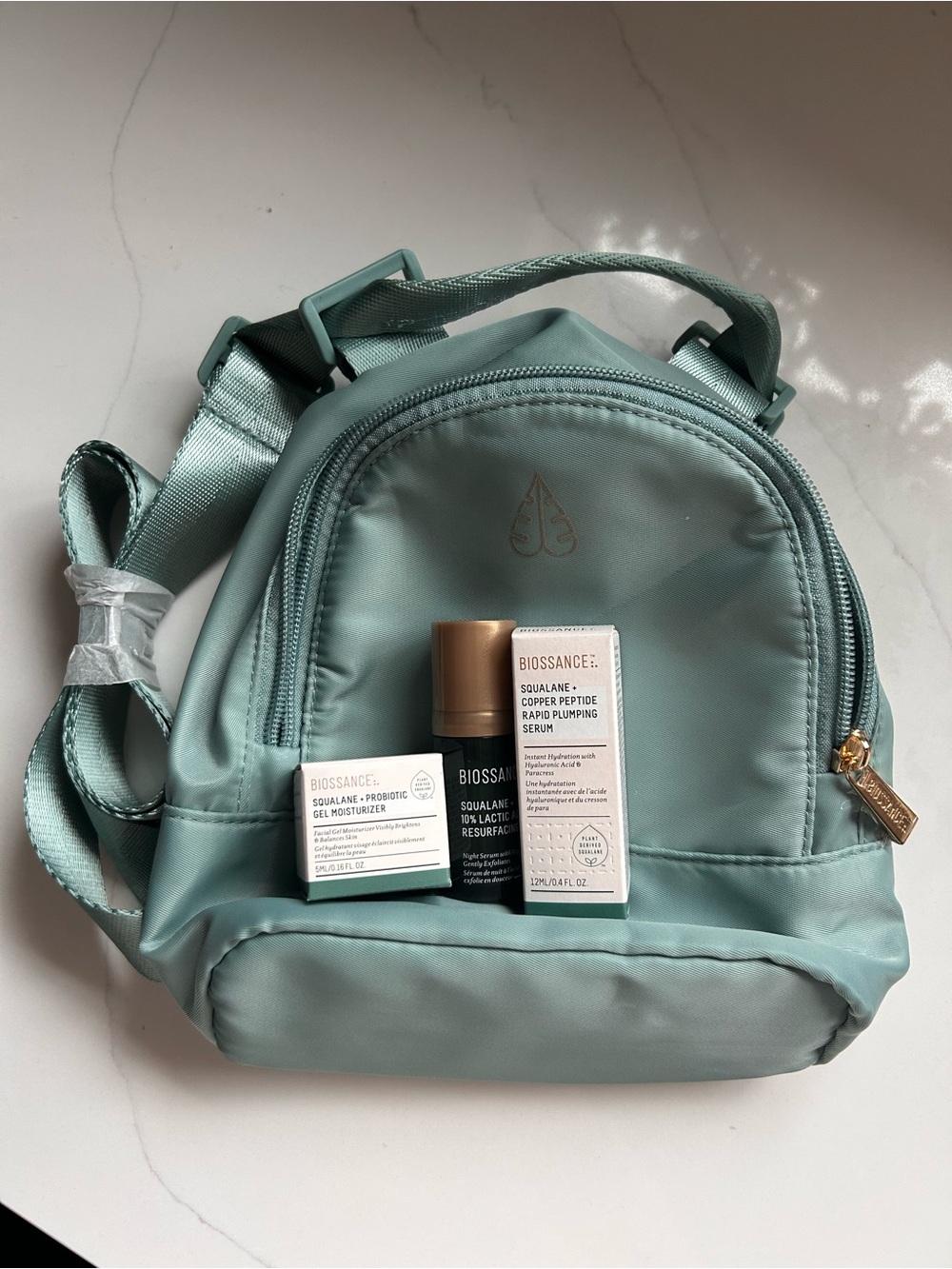Biossance Squalane Skincare Set with Mint Mini Bakcpack Carrying Case